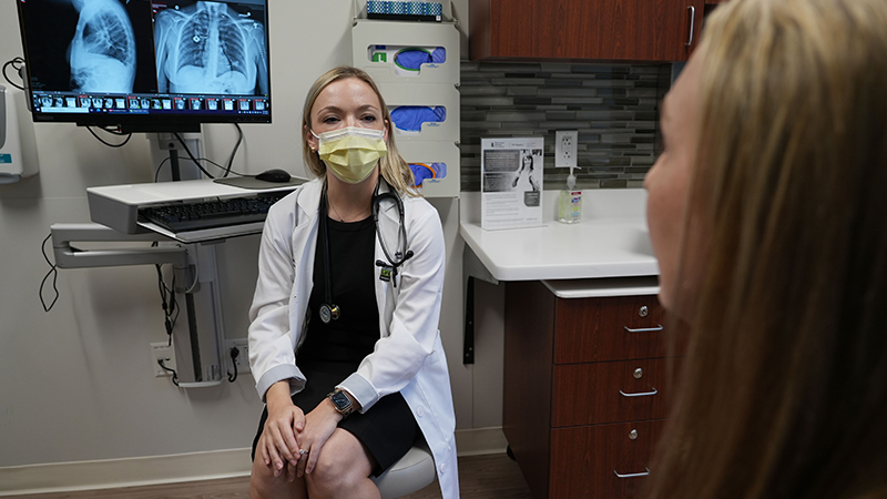 Mandy Wilk and Catherine N. Myers, MD with lung X-rays.