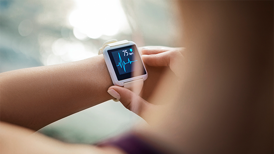 A person checking their Smartwatch